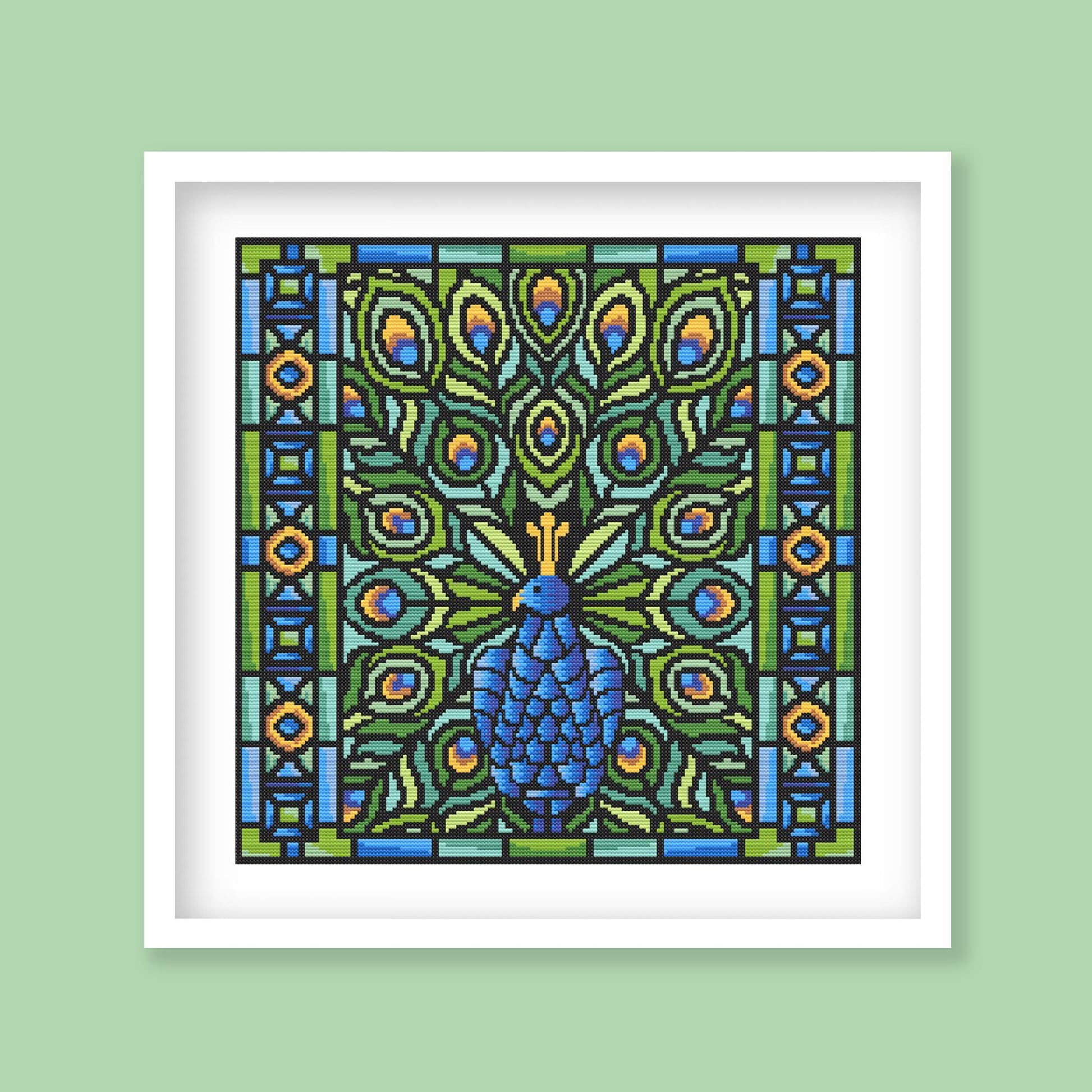 Framed artwork of a peacock design on a green background