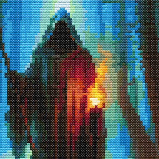 Close-up of Grim Reaper Cross Stitch Pattern showing the hooded figure, scythe, blue moonlight, and visible counted cross stitch texture.