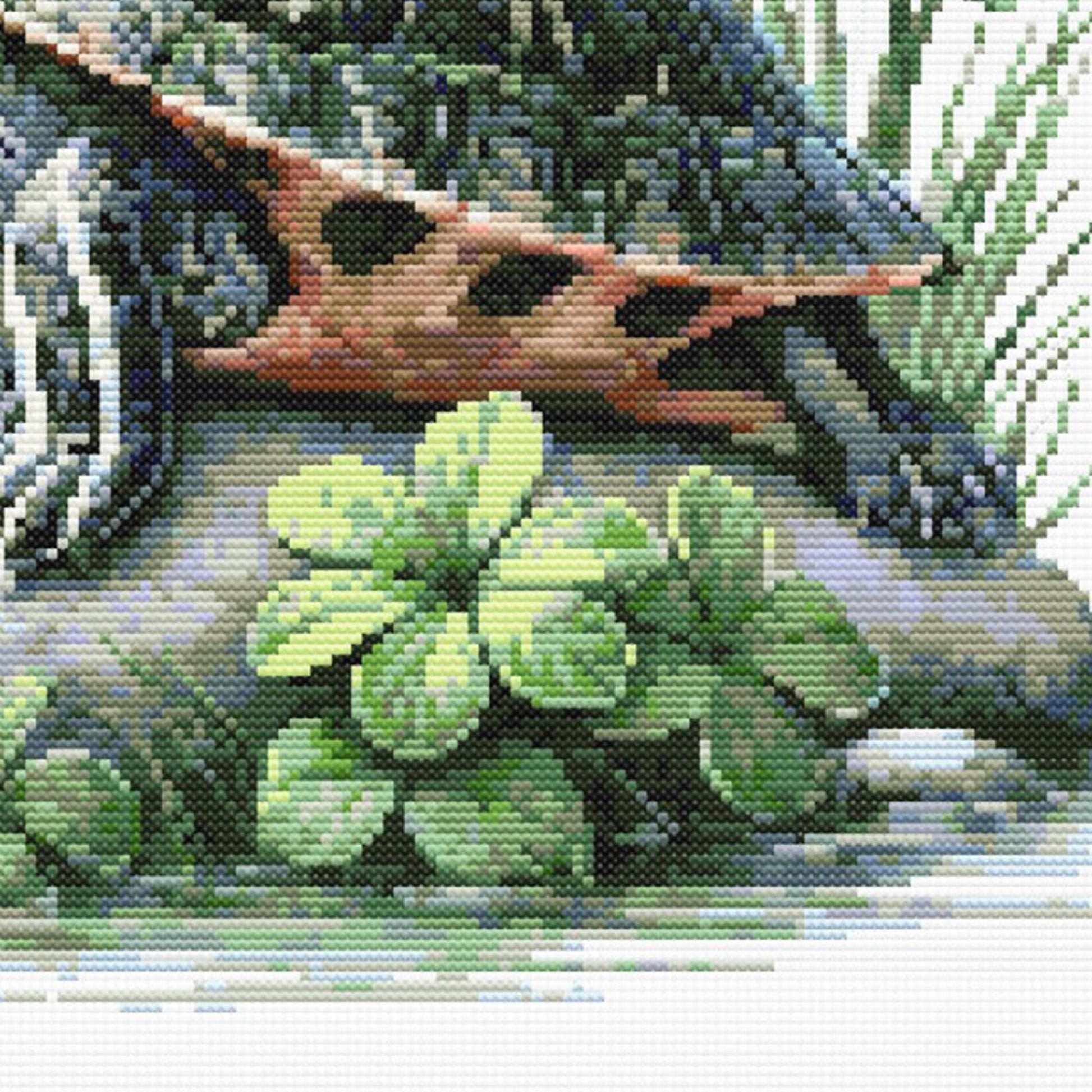 Close-up of Red-Eared Slider Turtle Cross Stitch Pattern showing shell markings, turtle legs, green plant detail, and visible counted cross stitch texture.