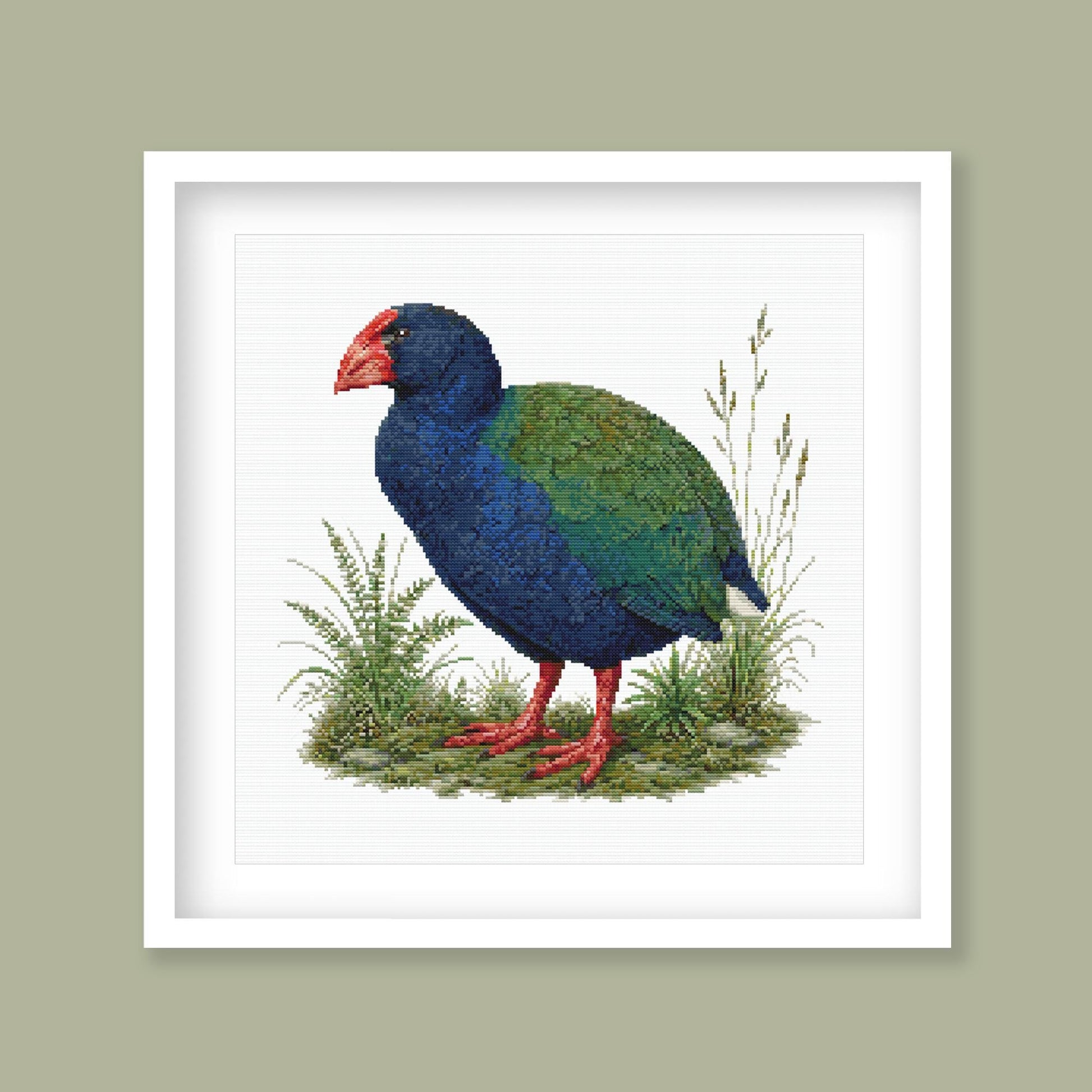Takahē Cross Stitch Pattern displayed in a green frame as native New Zealand bird wall art with colourful wildlife detail.