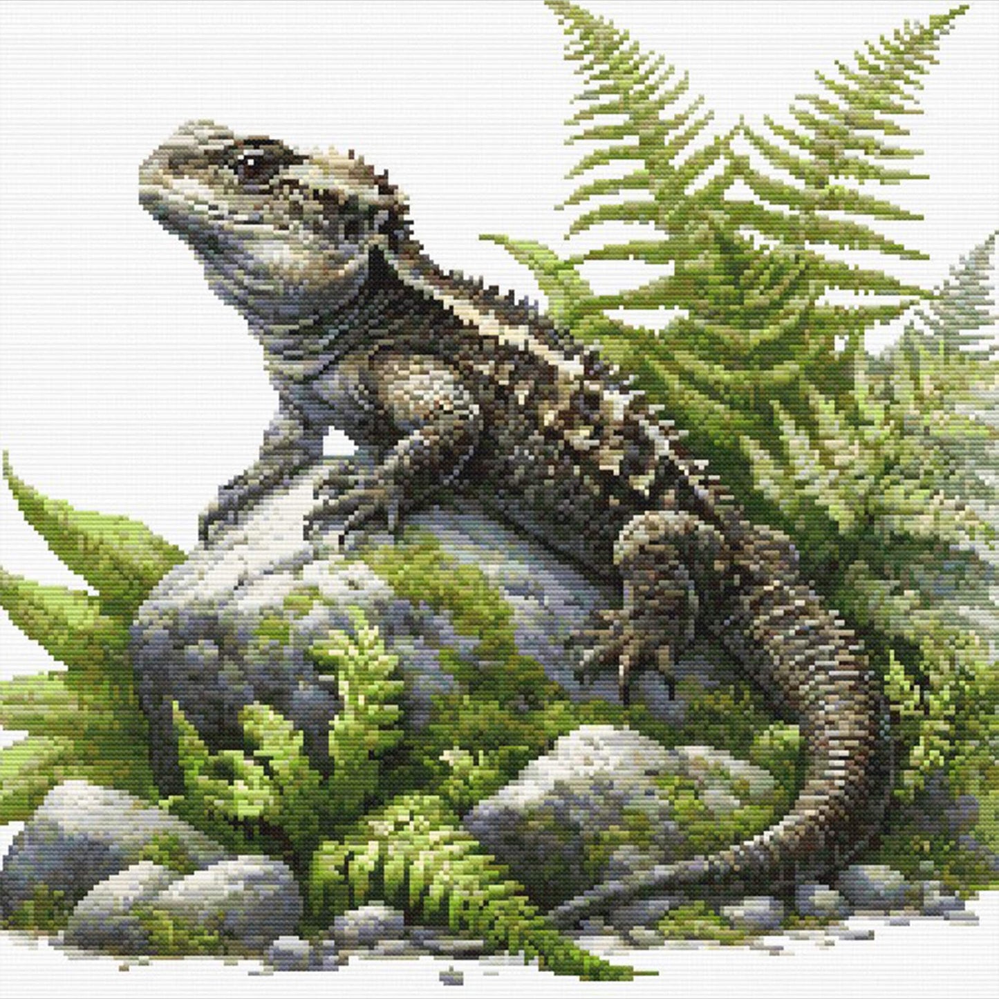 Tuatara Cross Stitch Pattern featuring a native New Zealand reptile resting among ferns, mossy rocks, and natural greenery.