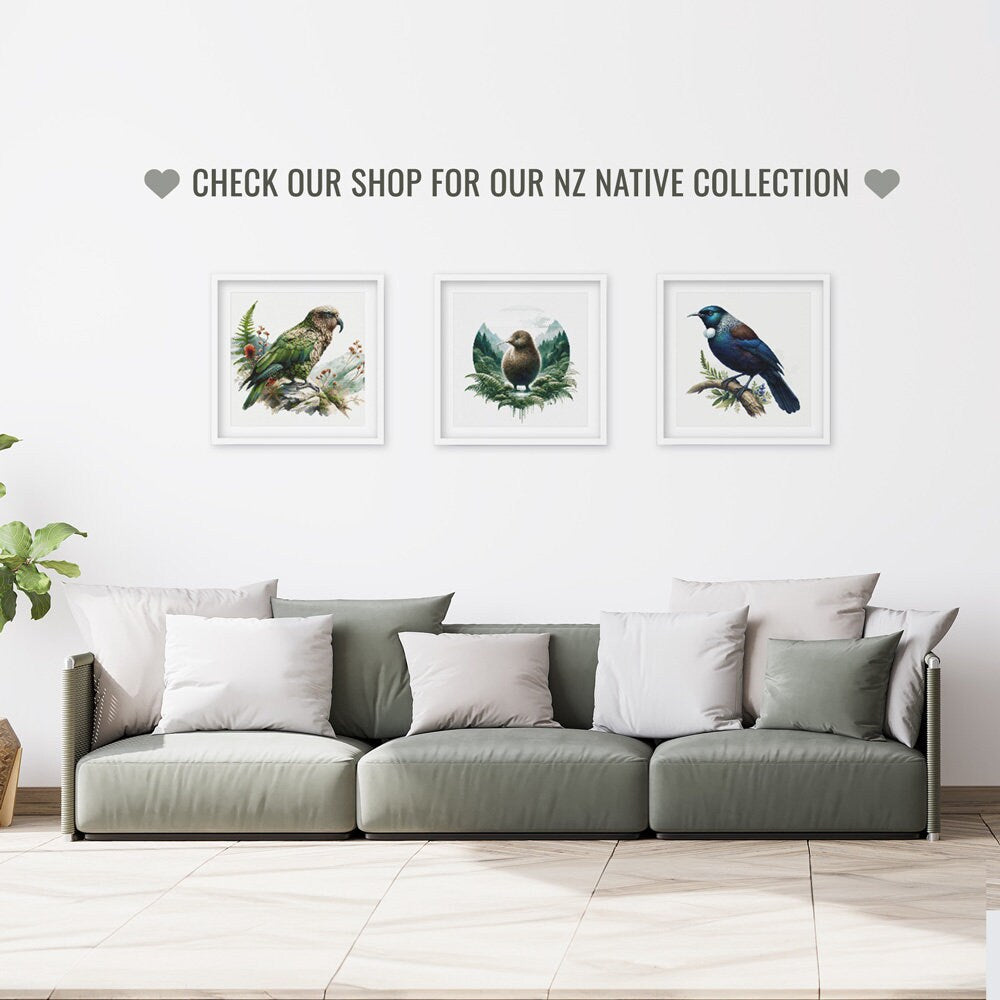 New Zealand Tui Cross Stitch Pattern shown in a room preview as native New Zealand bird wall art above a neutral sofa.