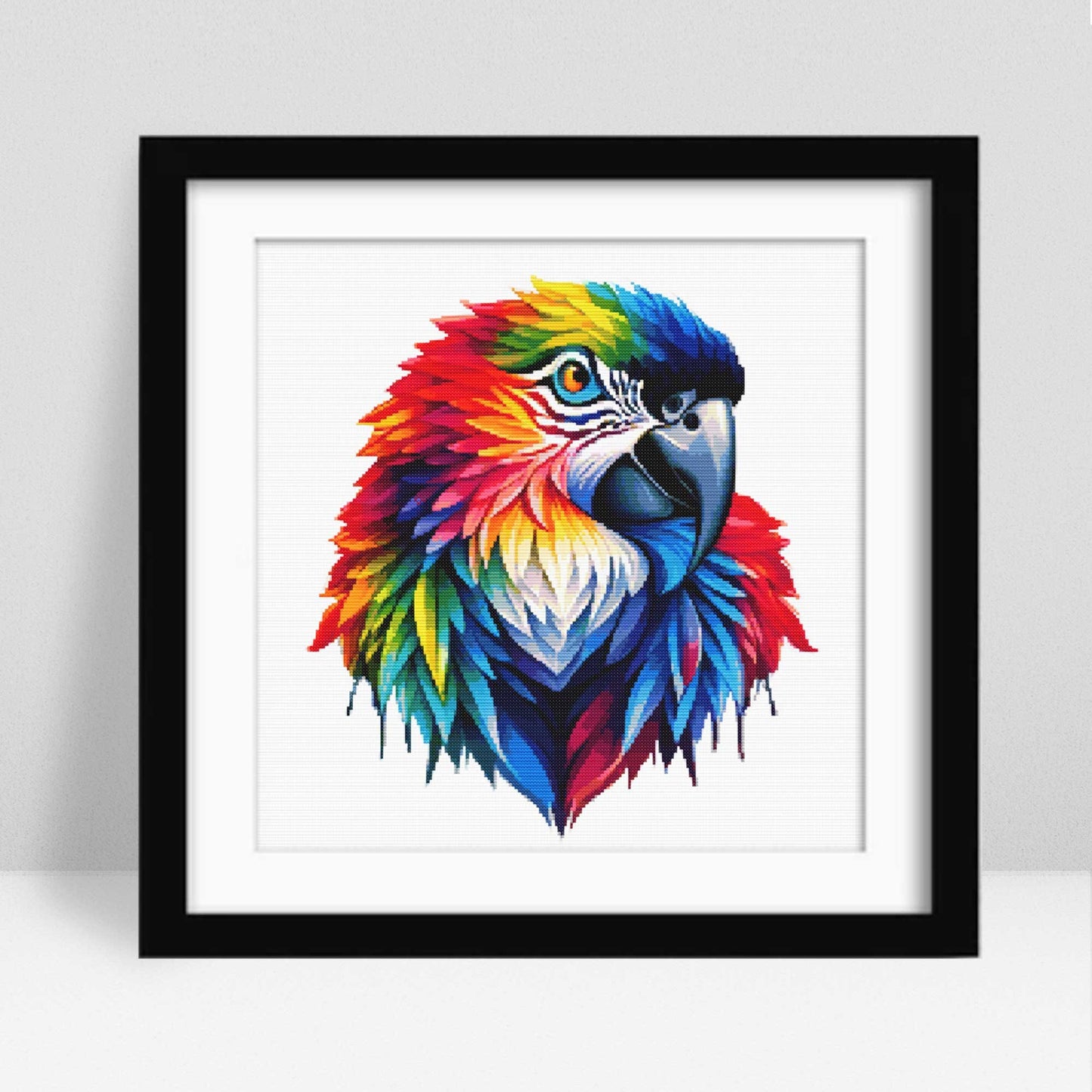 Framed artwork of a colorful parrot head on a white background