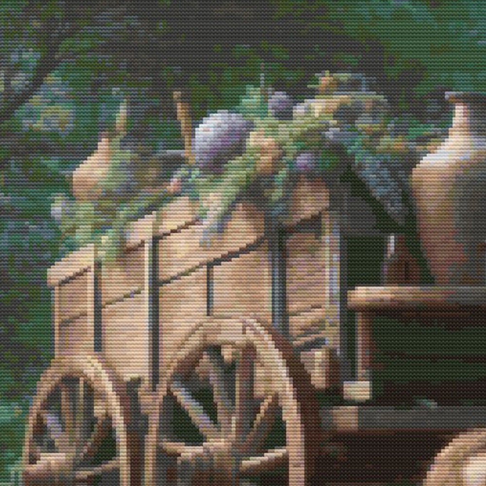 Close-up of Victorian Garden Cross Stitch Pattern showing a vintage garden cart, greenery, flowers, stone path, and soft countryside styling.