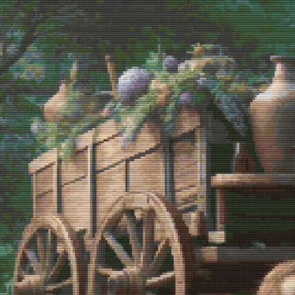 Close-up of Victorian Garden Cross Stitch Pattern showing a vintage garden cart, greenery, flowers, stone path, and soft countryside styling.