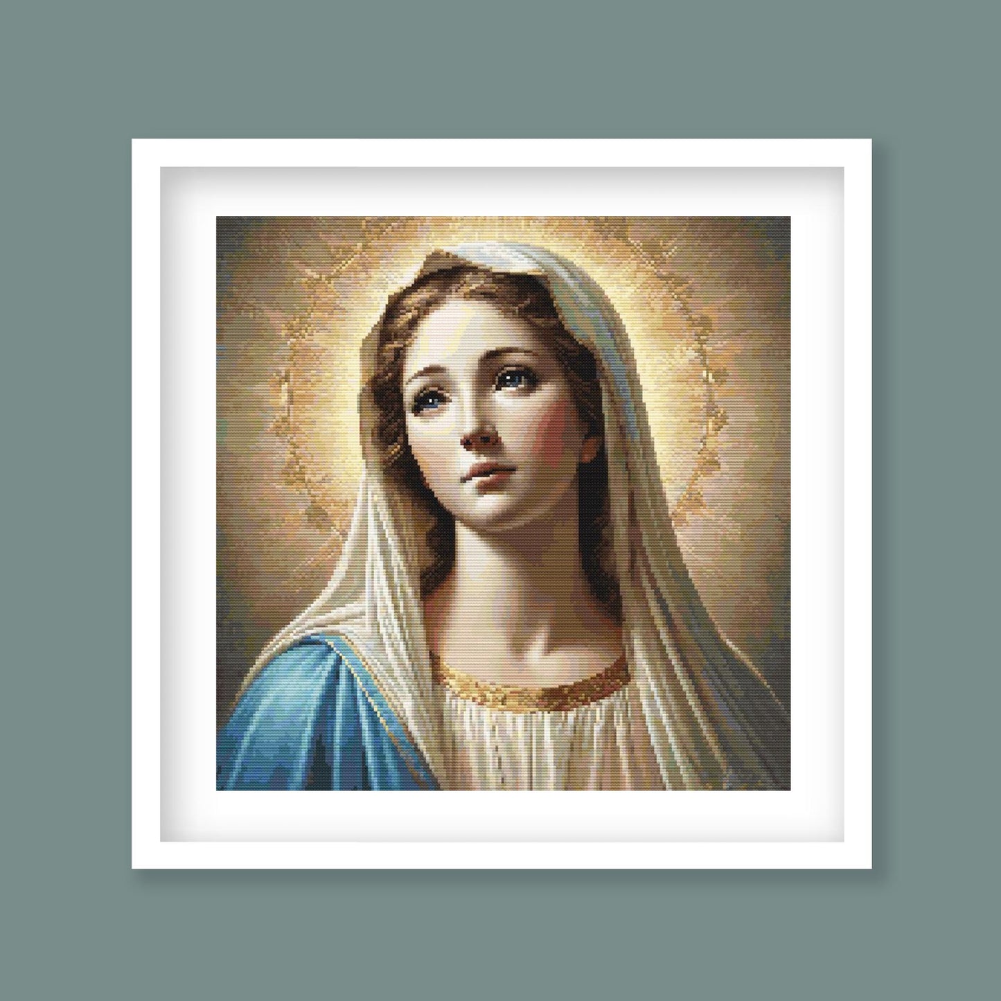 Virgin Mary Cross Stitch Pattern displayed in a green frame as religious wall art with Mother Mary, halo detail, and soft devotional colour.