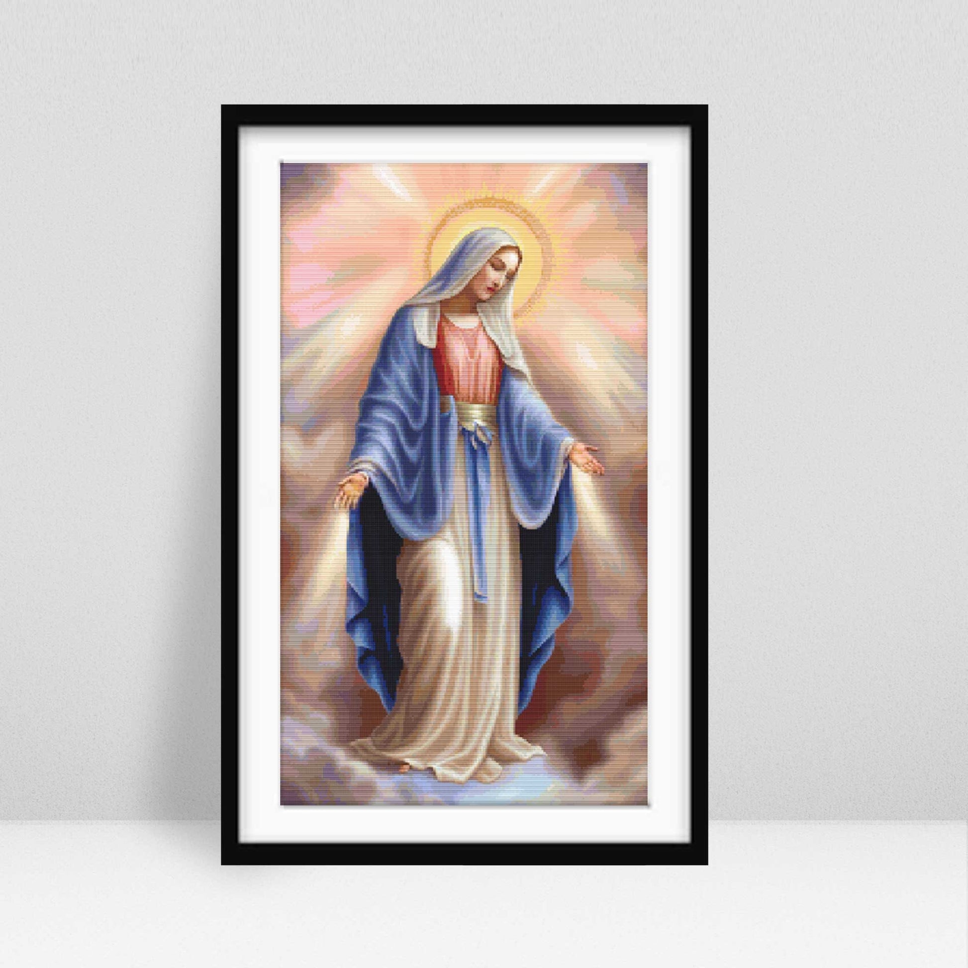Virgin Mary cross stitch pattern displayed in a black frame as elegant religious wall art for Christian home decor.