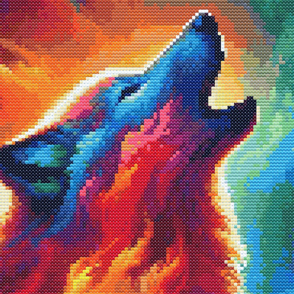 Close-up of wolf cross stitch pattern showing detailed stitching, wolf fur texture, and dramatic moonlit colours