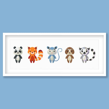 Cute Woodland Animal Cross Stitch Pattern displayed in a blue frame with a row of colourful animal characters for children’s room decor.